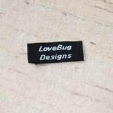 Woven Label F174 Two lines of italics text